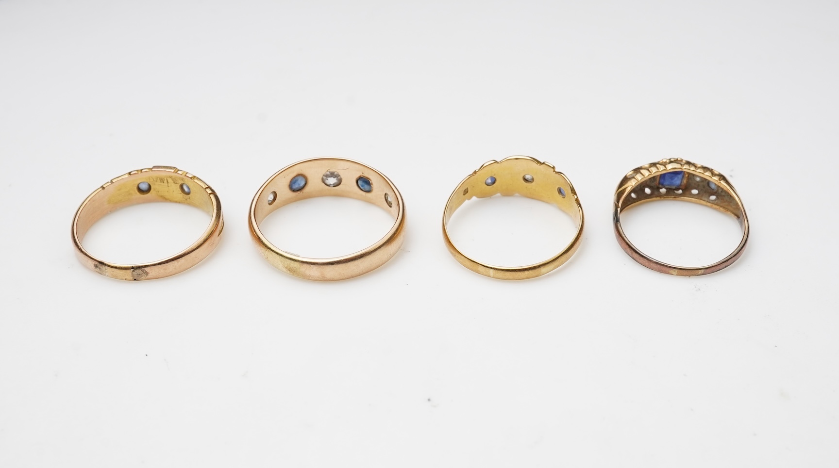 A group of four sapphire rings, late 19th/early 20th century